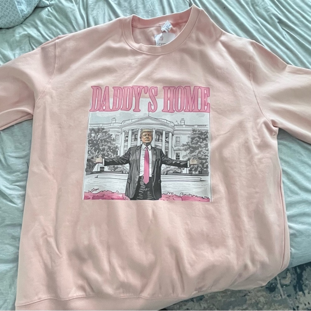 Pink Trump “Daddy’s Home” sweater